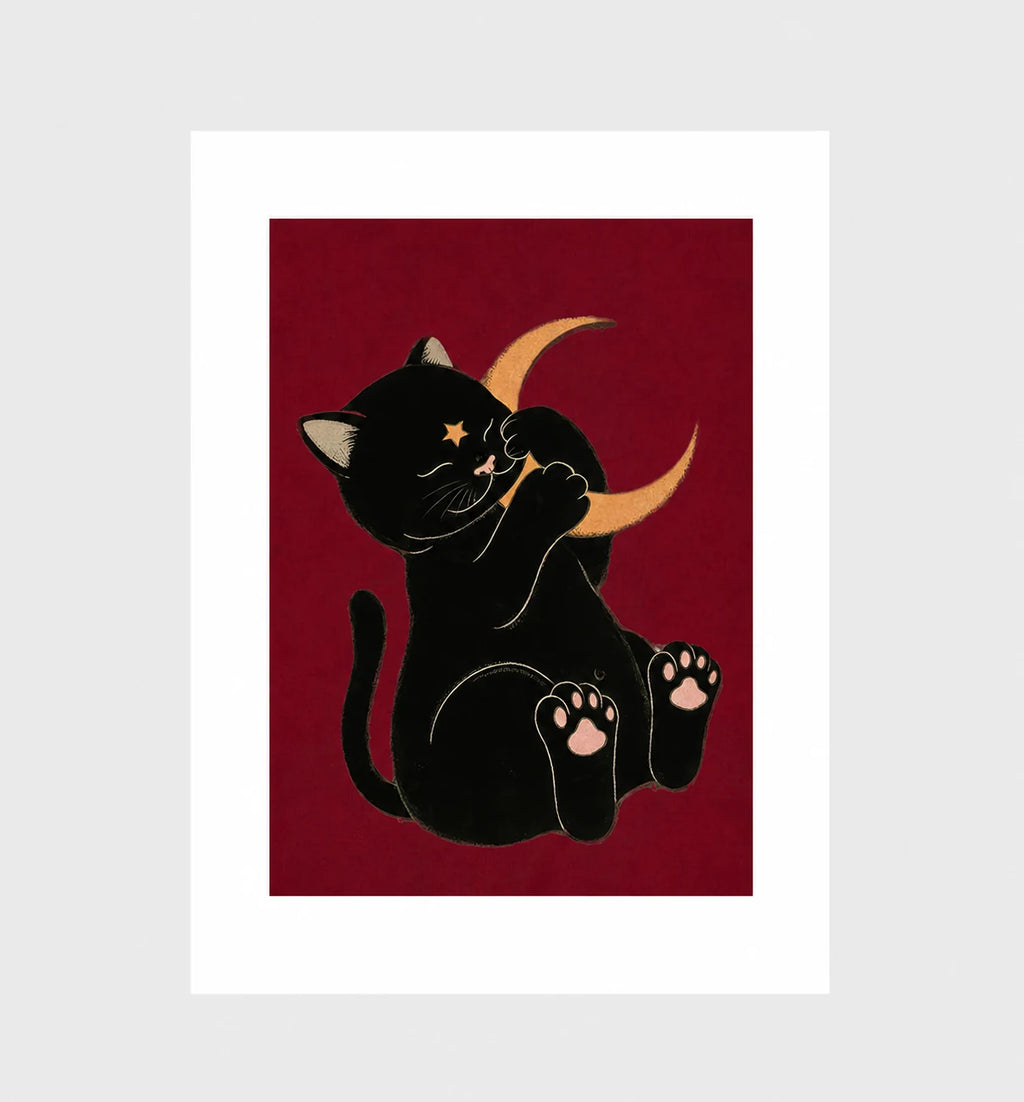 Moonstruck by Muse and Paw, an illustrated print of a black cat holding a gold crescent moon on a deep red ground, shown flat as a bordered fine art print.