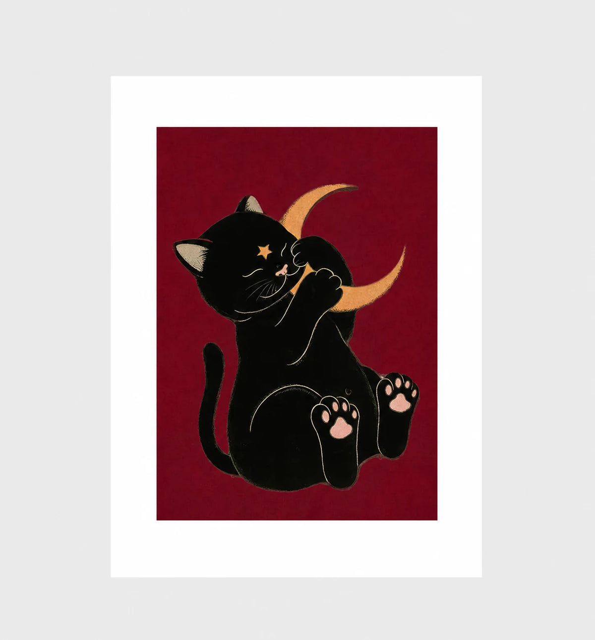 Moonstruck by Muse and Paw, an illustrated print of a black cat holding a gold crescent moon on a deep red ground, shown flat as a bordered fine art print.